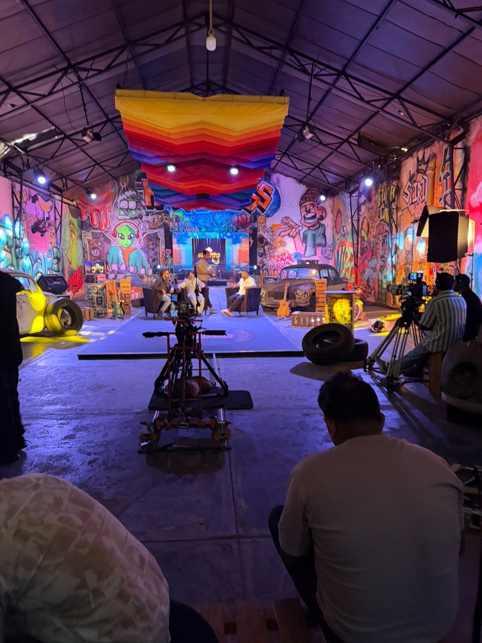 Television studio set with colourful graffiti walls