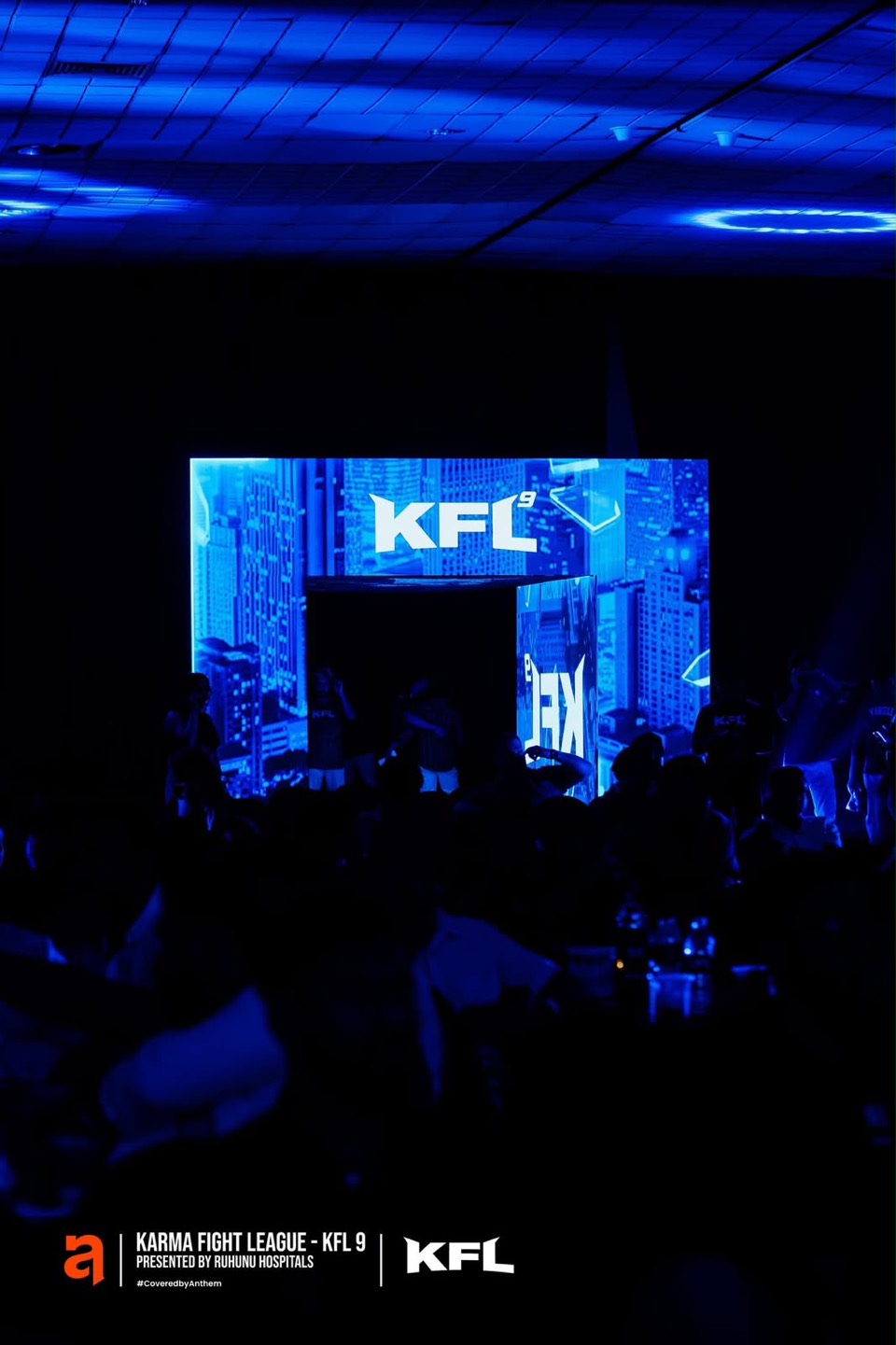 Blue LED entrance arch in a dark arena